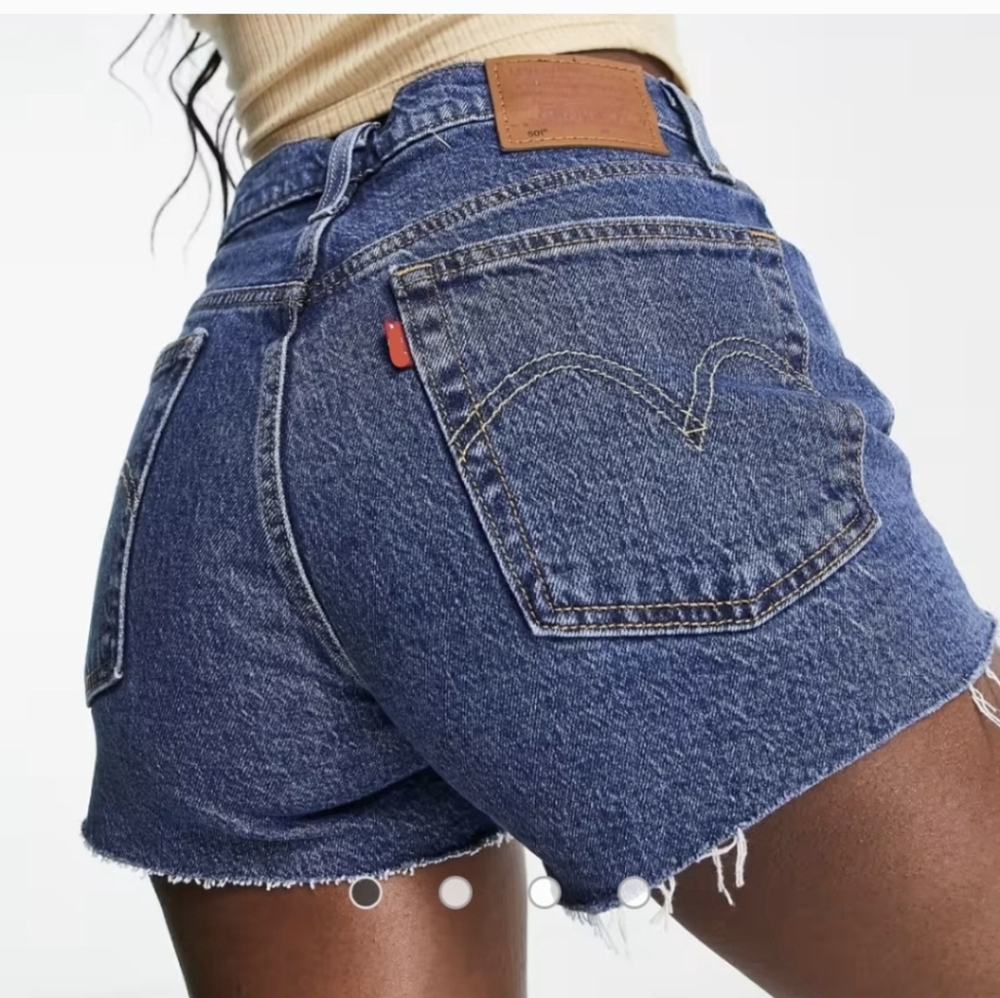 Vintage Levi 501 original fit Button fly Frayed Jean shorts